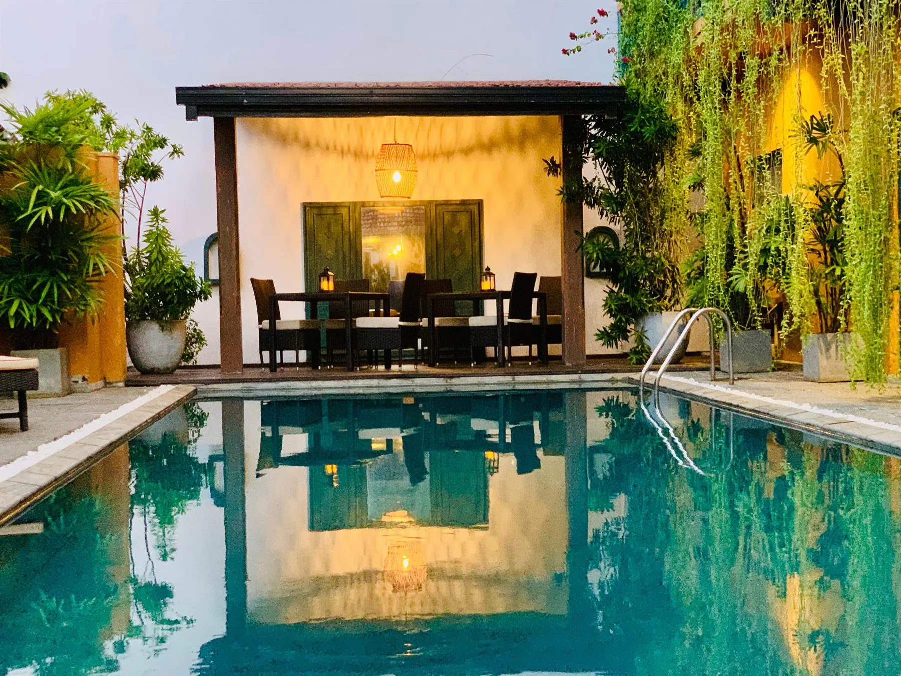 Luxury hotel pool in a tropical garden