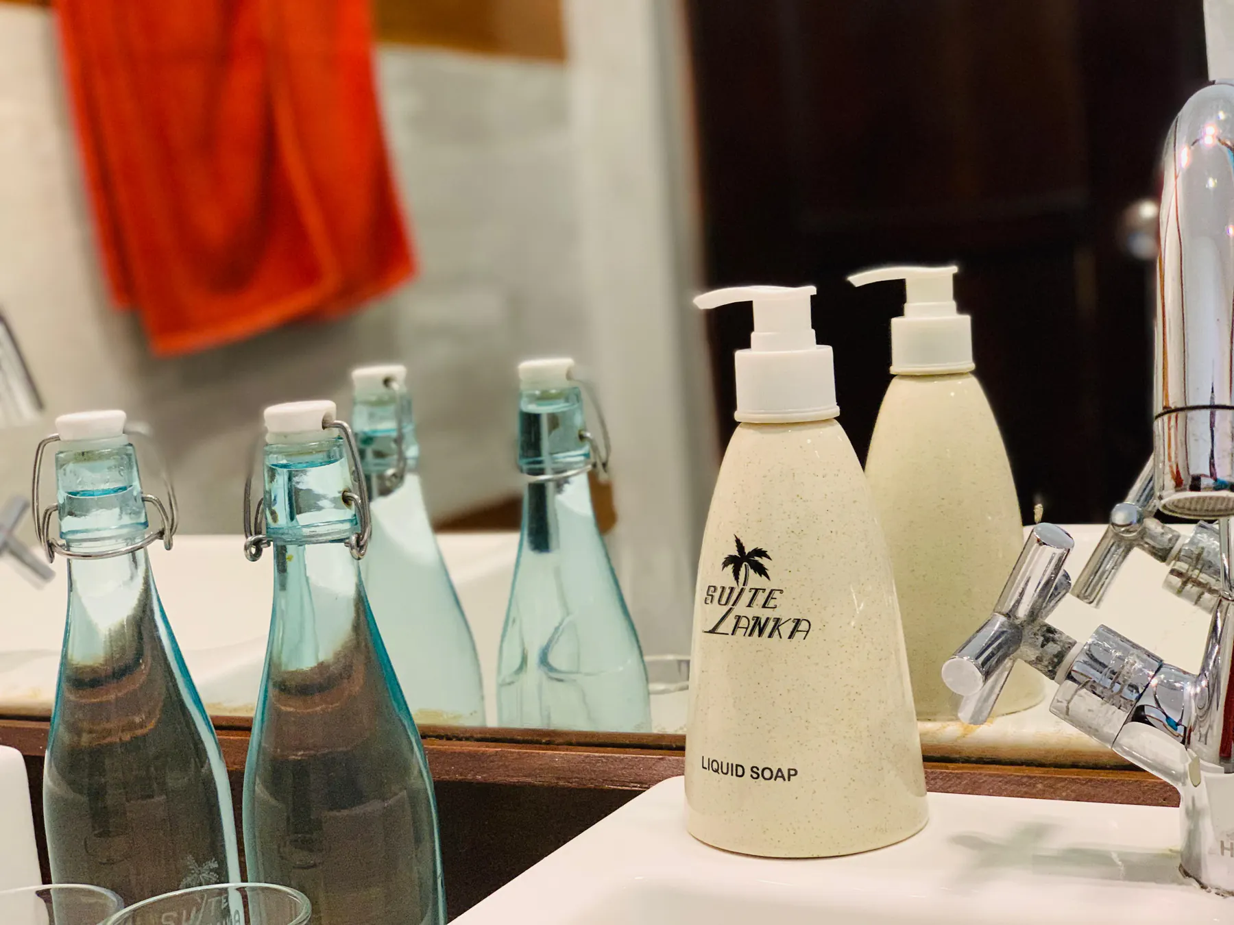 Deluxe Double bathroom amenities and bottled water